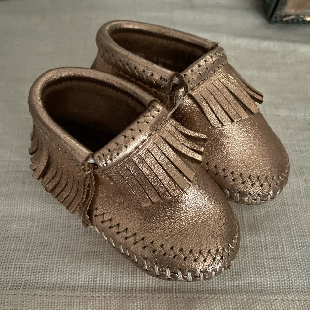 Rose gold Minnetonka moccasins